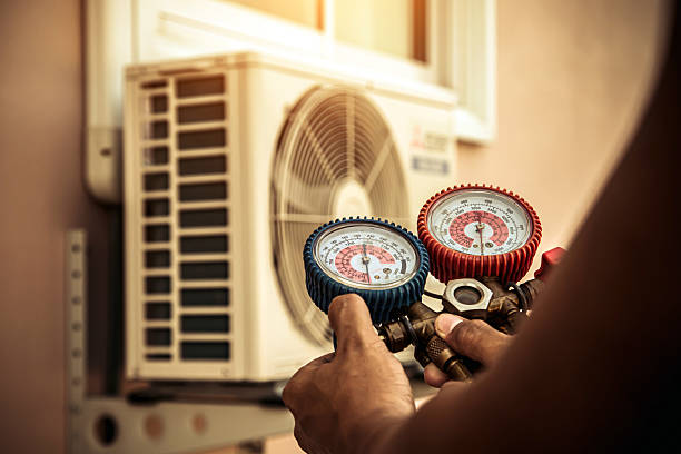 Professional Hvac technician working in Woodville, TX